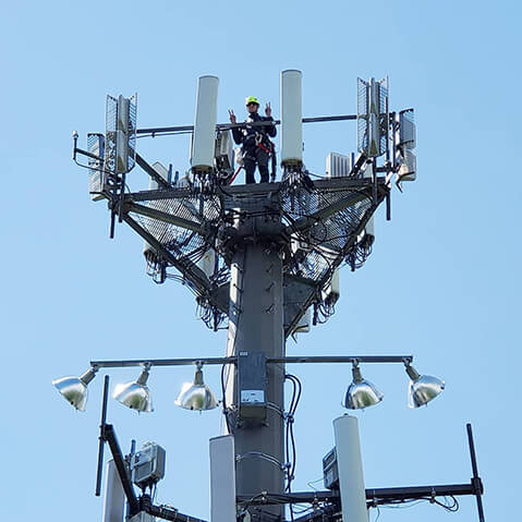 Tilson employee atop cell tower